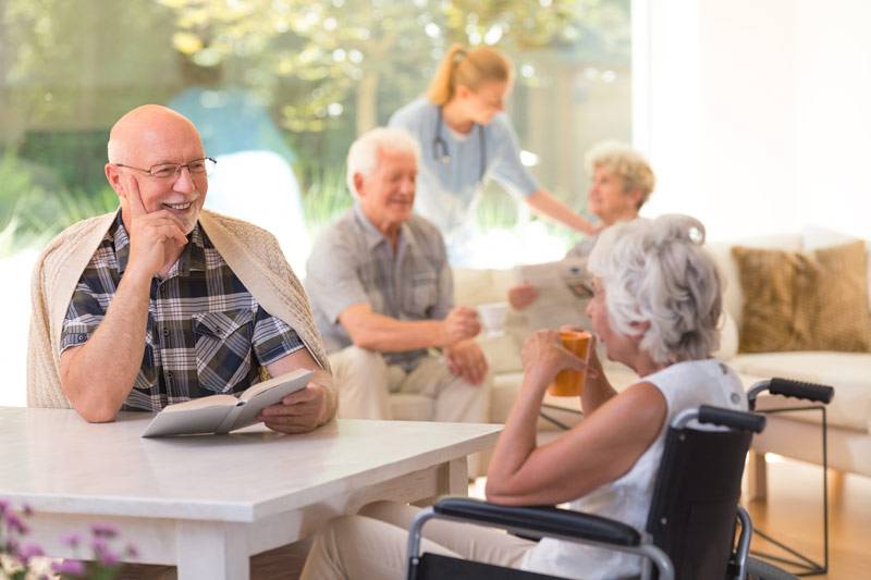 WLC Residents talking and reading